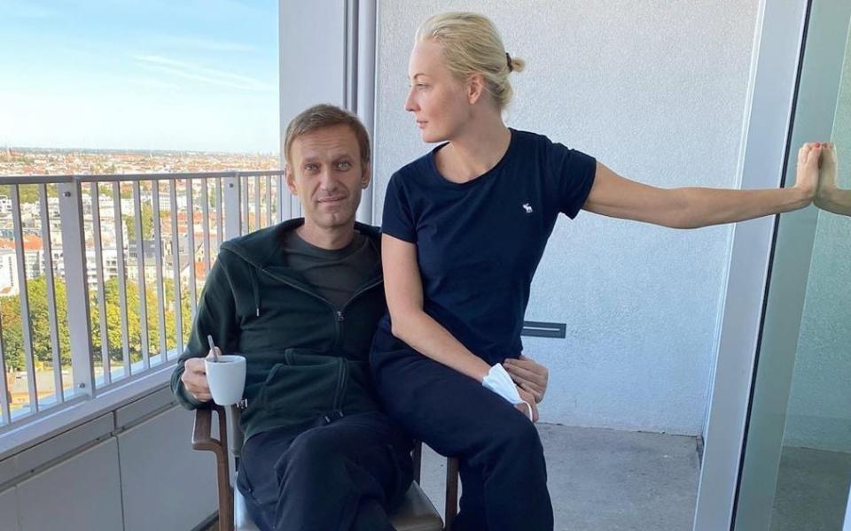 Alexei Navalny, pictured with his wife Yulia, has been convalescing in a Berlin hospital since late August when he evacuated from Siberia - Handout/EPA-EFE