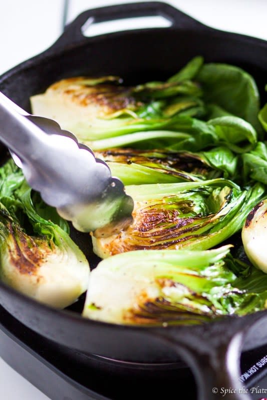 <p>This spicy cast iron grilled bok choy is incredibly easy to make, all you need is a hot cast iron pan!</p><p><strong>Get the recipe: <a href="https://www.spicetheplate.com/veggie/spicy-cast-iron-grilled-bok-choy/" rel="nofollow noopener" target="_blank" data-ylk="slk:Spicy Cast Iron Grilled Bok Choy;elm:context_link;itc:0;sec:content-canvas" class="link "><em>Spicy Cast Iron Grilled Bok Choy</em></a></strong></p>