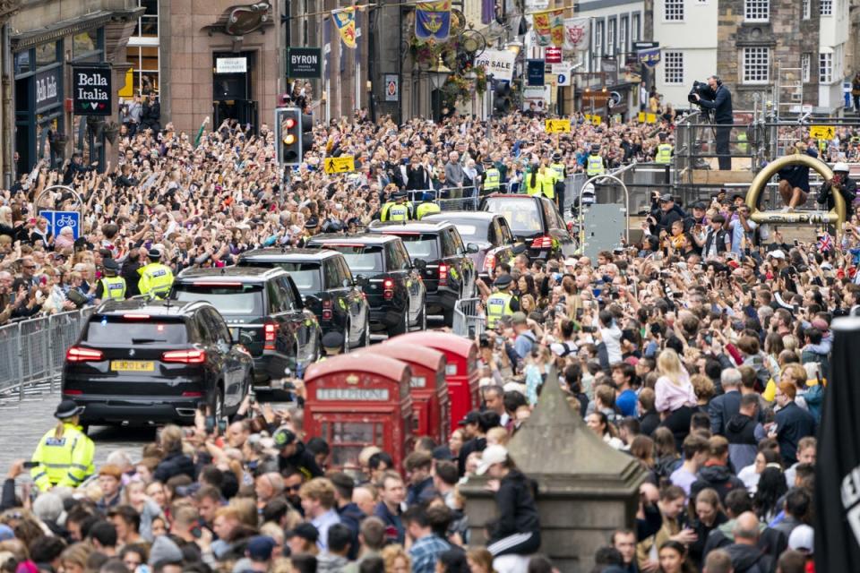 The procession travels through Edinburgh (Jane Barlow/PA) (PA Wire)