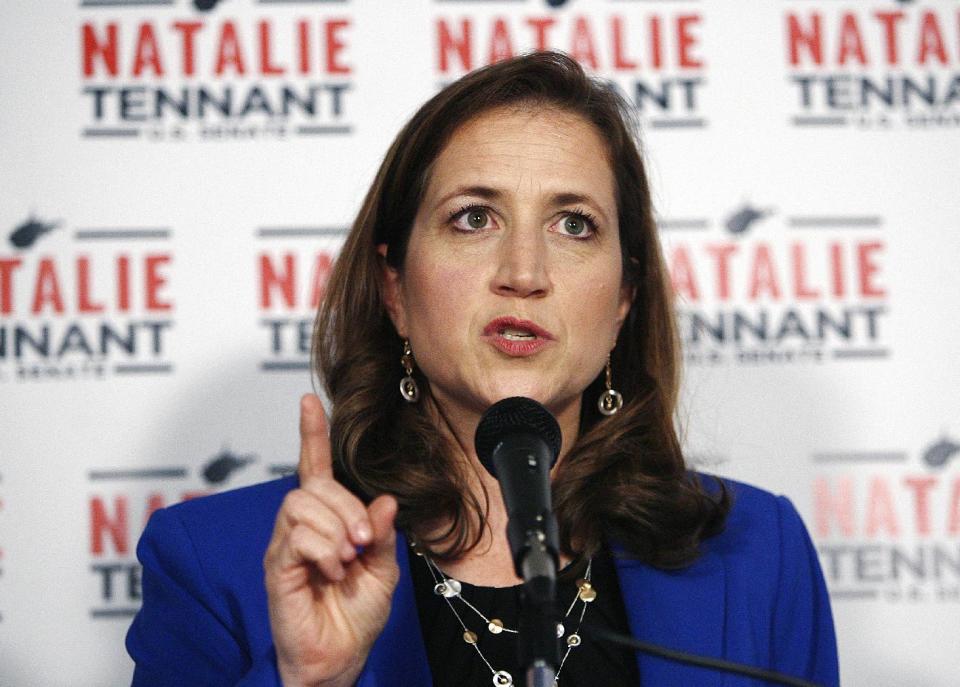 West Virginia Secretary of State Natalie Tennant celebrates Tuesday, May 13, 2014, at her headquarters in Charleston, W.Va. Tennant won the primary election Tuesday and secured the Democratic nomination for the US Senate position soon to be vacated by Sen. John D. Rockefeller IV (D). (AP Photo/Randy Snyder)