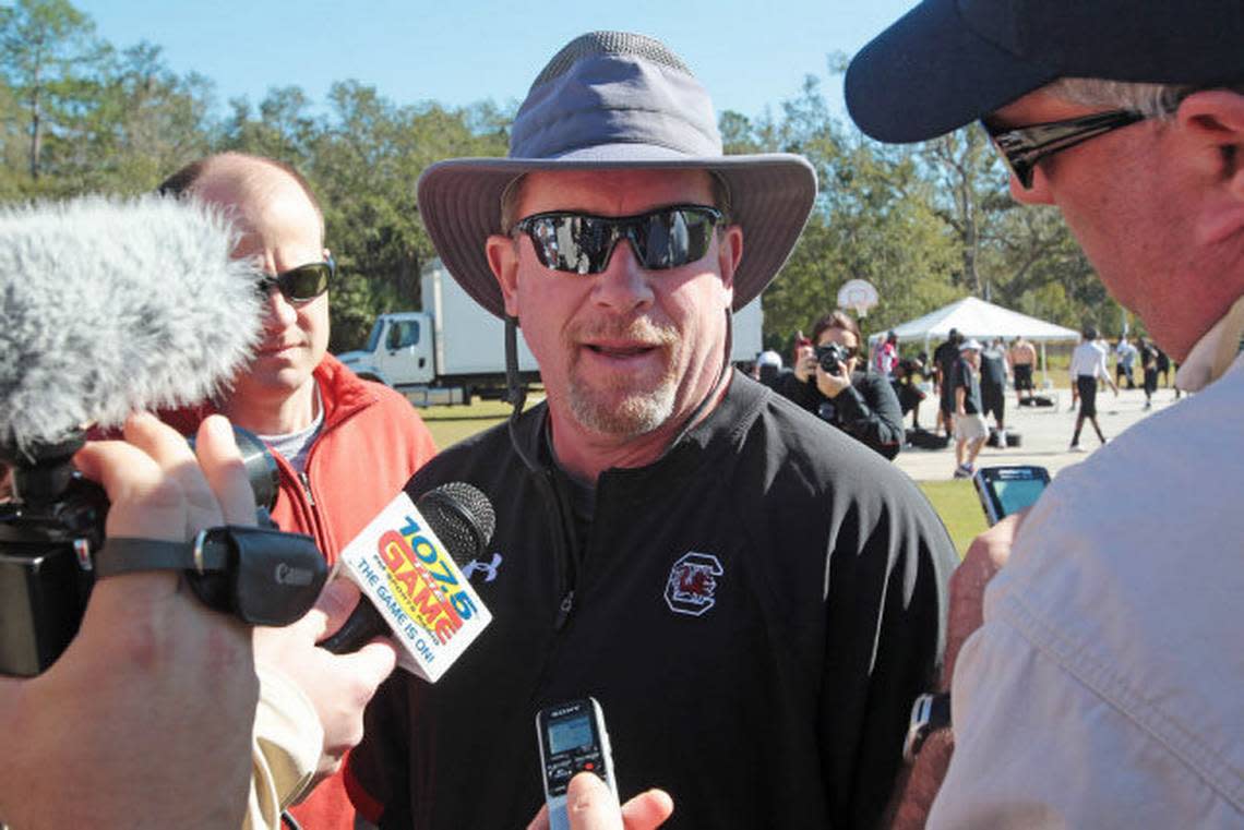 USC defensive line coach Brad Lawing talks to the media after the Gamecocks practice at Celebration High School, Wednesday, December 28, 2011.