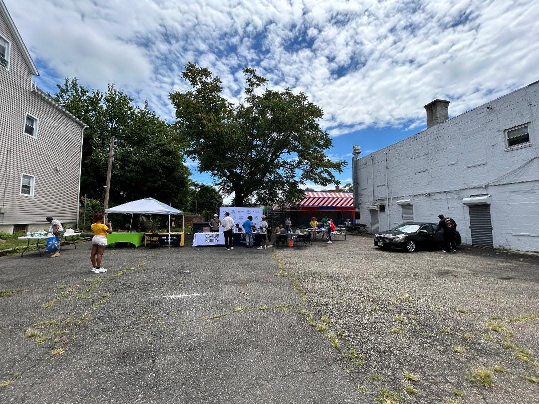 About 20 people attended an expungement clinic Saturday in the parking lot behind Black Lives Matter Paterson’s headquarters on Broadway.