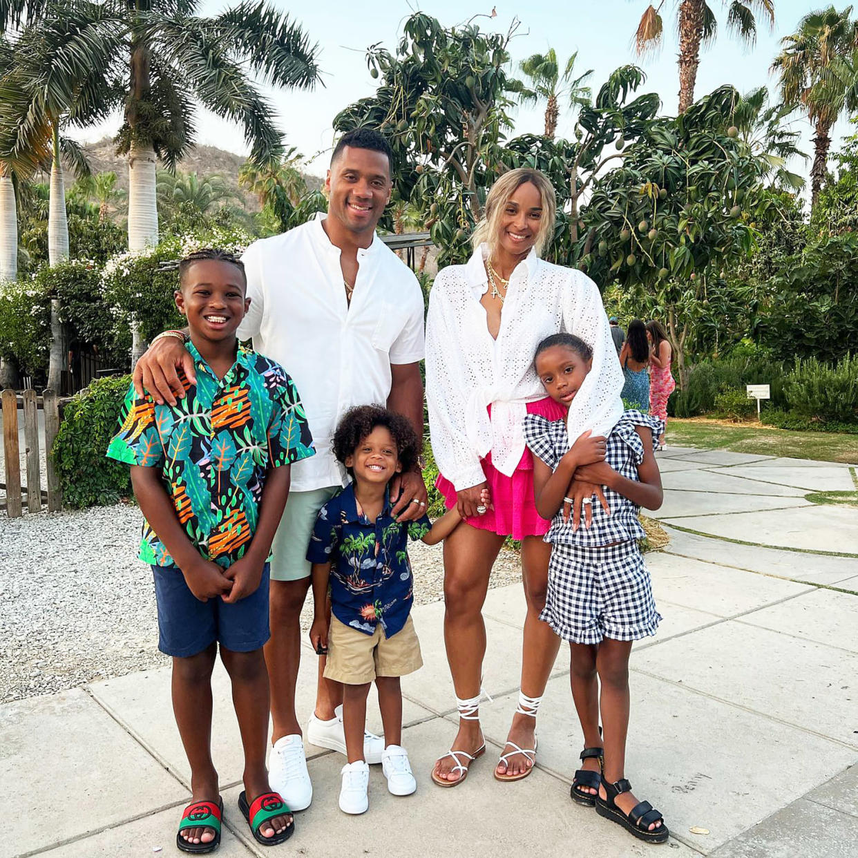 Ciara and Russell Wilson smile with their kids: Future, Win and Sienna. (@dangerusswilson via Instagram)