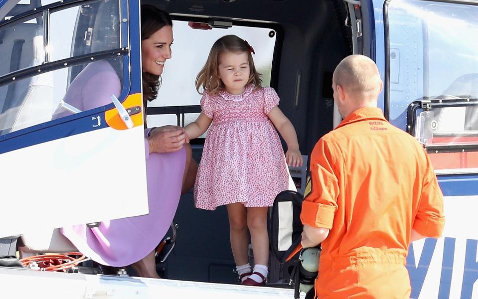 Princess Charlotte played in the helicopter to play under the eye of her mother - Credit: Chris Jackson/Getty