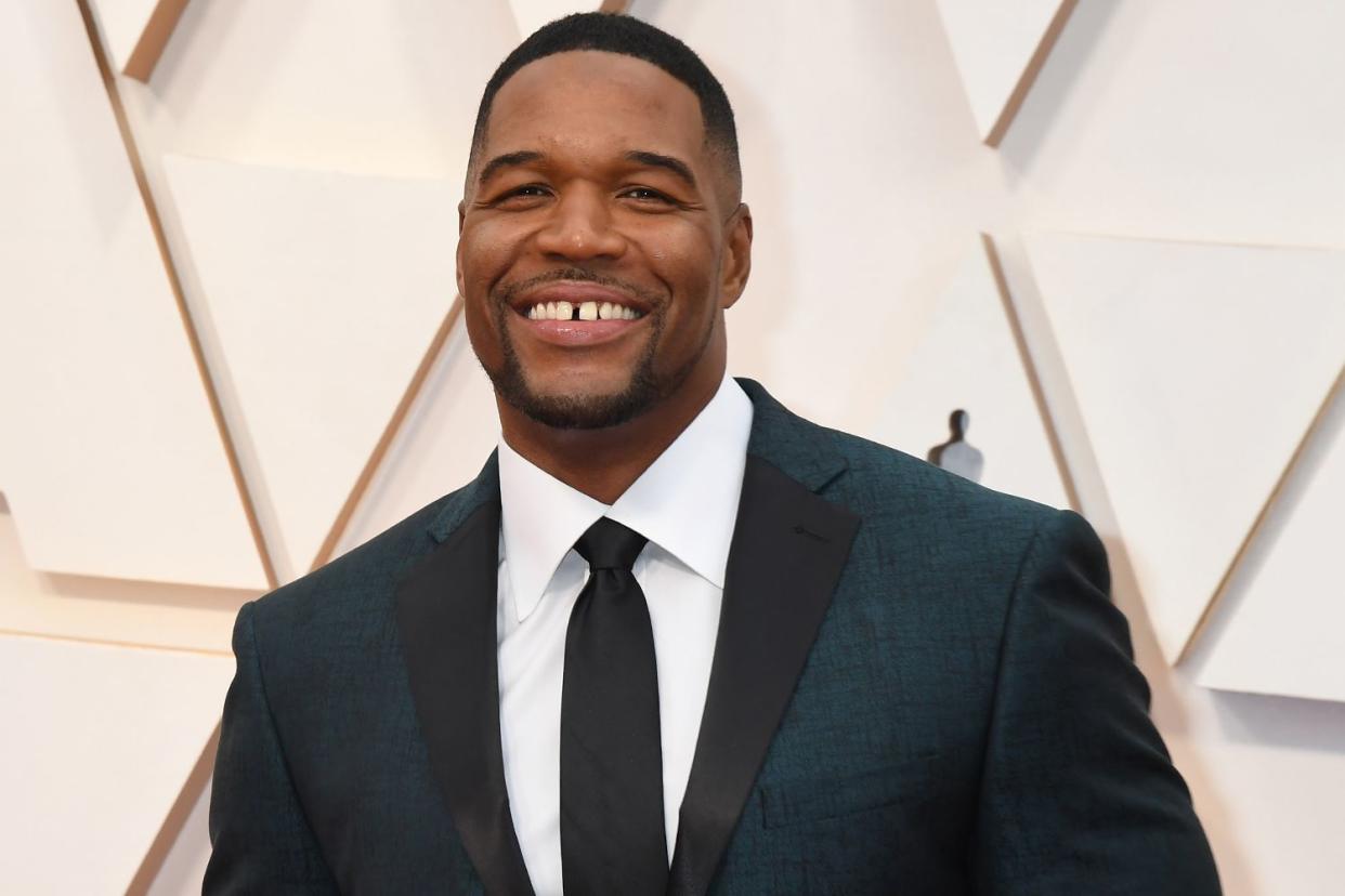 <p>Jeff Kravitz/FilmMagic</p> Michael Strahan attends the 92nd Annual Academy Awards on February 9, 2020