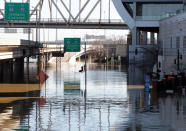 <p>Water covers River Road in downtown Louisville and the on and off ramps to Interstate 64 after the Ohio River flooded Louisville, Ky., Feb. 26, 2018. (Photo: John Sommers II/Reuters) </p>