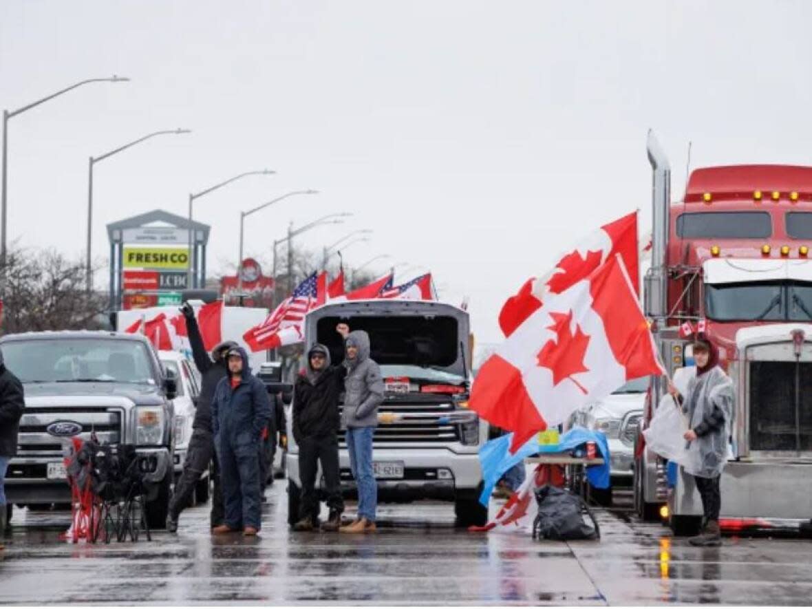 Protesters block access to the Ambassador Bridge in February. (Evan Mitsui/CBC - image credit)