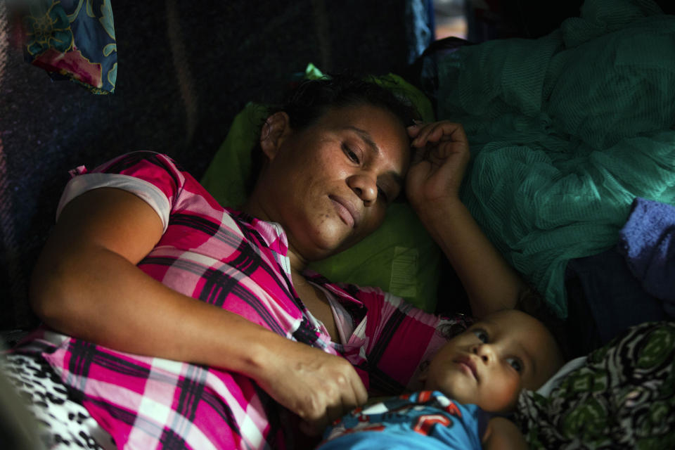 Fany Sirei, 38, from Honduras rests next to her 15-month-old child Junior Yair at a shelter, Friday, Sept. 17, 2021, in Ciudad Acuña, Mexico. Sirei has been waiting for six months in Mexico to enter the United States.(Marie D. De Jesús/Houston Chronicle via AP)