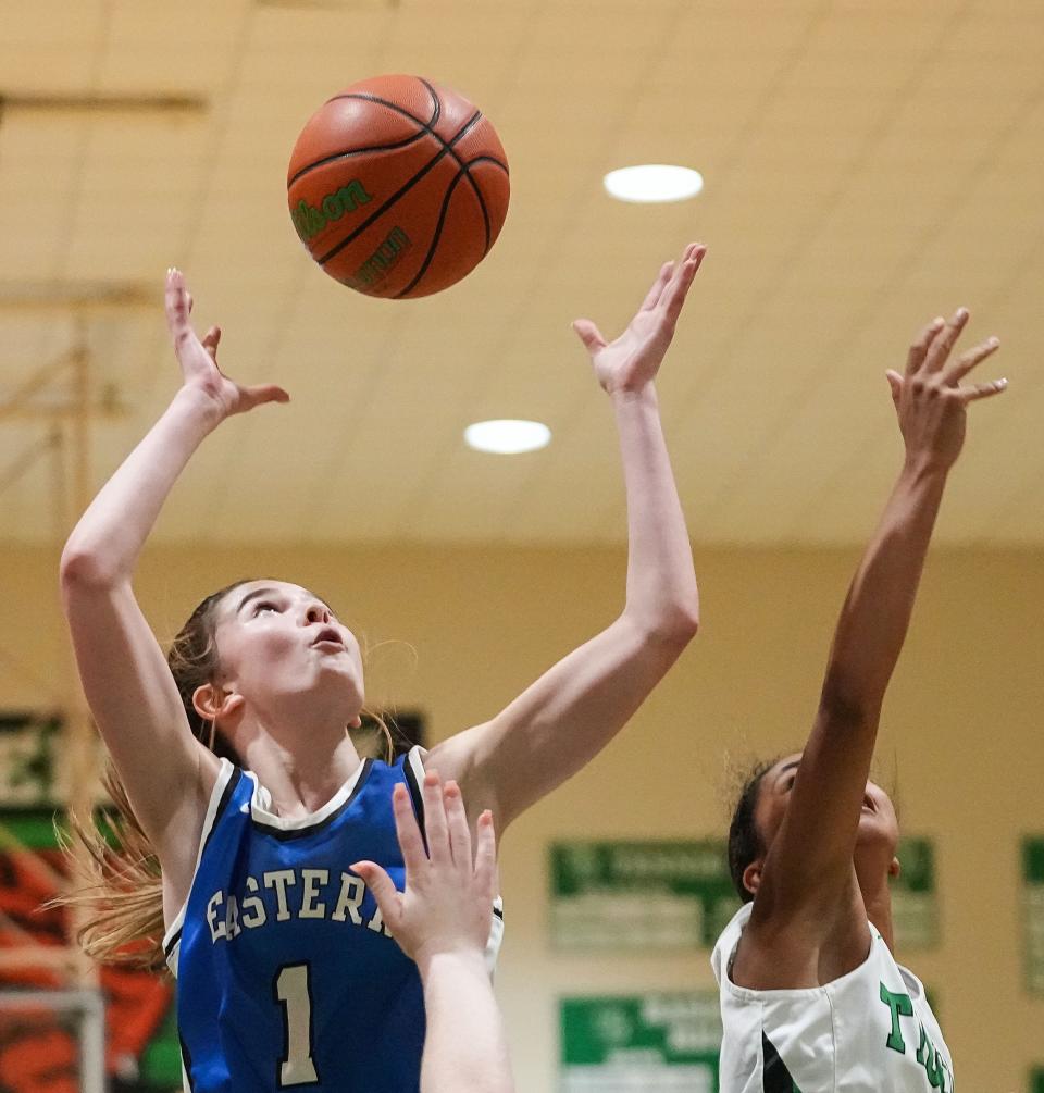 Eastern Hancock Royals McKenzie Koch (1) recovers a rebound Saturday, Nov. 11, 2023, during the game at Triton Central High School in Fairland. The Eastern Hancock Royals defeated the Triton Central Tigers, 50-41.