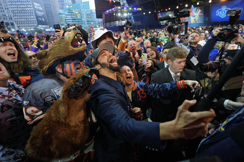 Southern California quarterback Caleb Williams celebrates after being chosen by the Chicago Bears with the first overall pick during the first round of the NFL football draft, Thursday, April 25, 2024, in Detroit. (AP Photo/Paul Sancya)