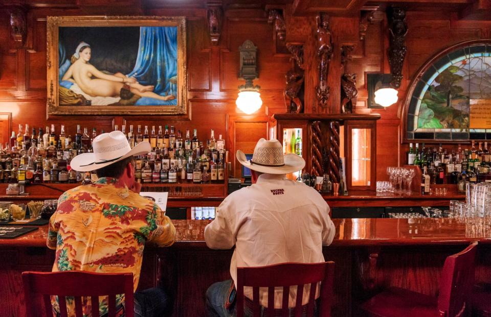 Customers sit at the bar for lunch at McClintock Saloon and Chop House in Oklahoma City.