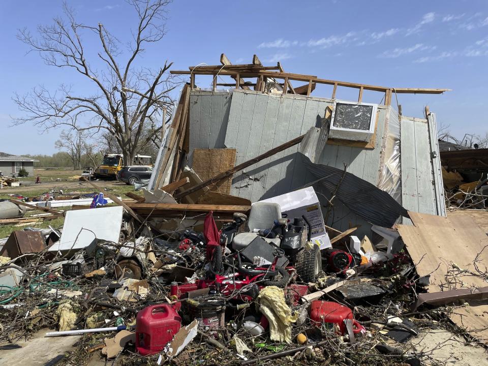 Debris covers the ground on Saturday, March 25, 2023 in Silver City, Miss. Emergency officials in Mississippi say several people have been killed by tornadoes that tore through the state on Friday night, destroying buildings and knocking out power as severe weather produced hail the size of golf balls moved through several southern states. (AP Photo/Michael Goldberg)