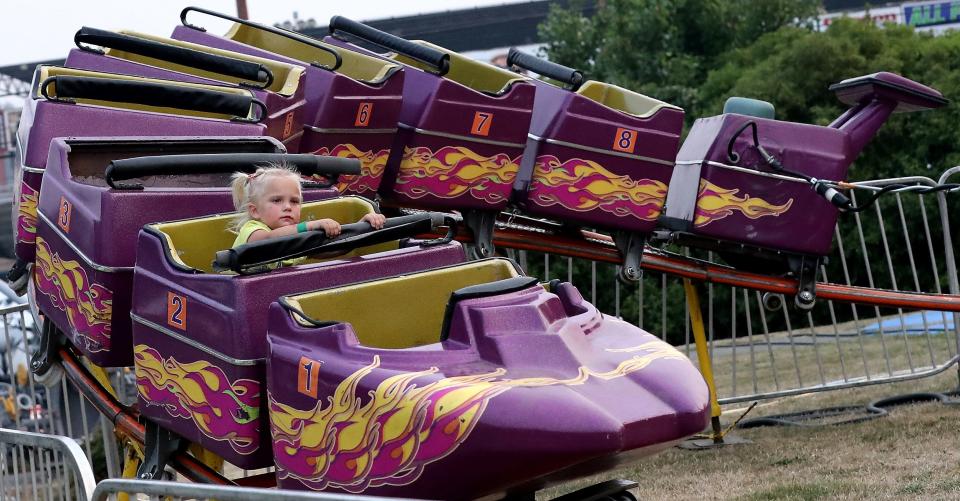 Belladonna Kindt, 3, gets a whole ride to herself during the opening day of the Kitsap County Fair & Stampede on Aug. 22, 2018.