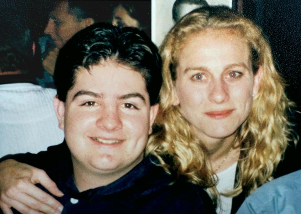 Murder victim Jason Burgeson with his sister, Kellie Surdis, in a 1999 family photo. Burgeson and his friend, Amy Shute, were killed execution-style on a Johnston golf course in 2000 after they had been carjacked.