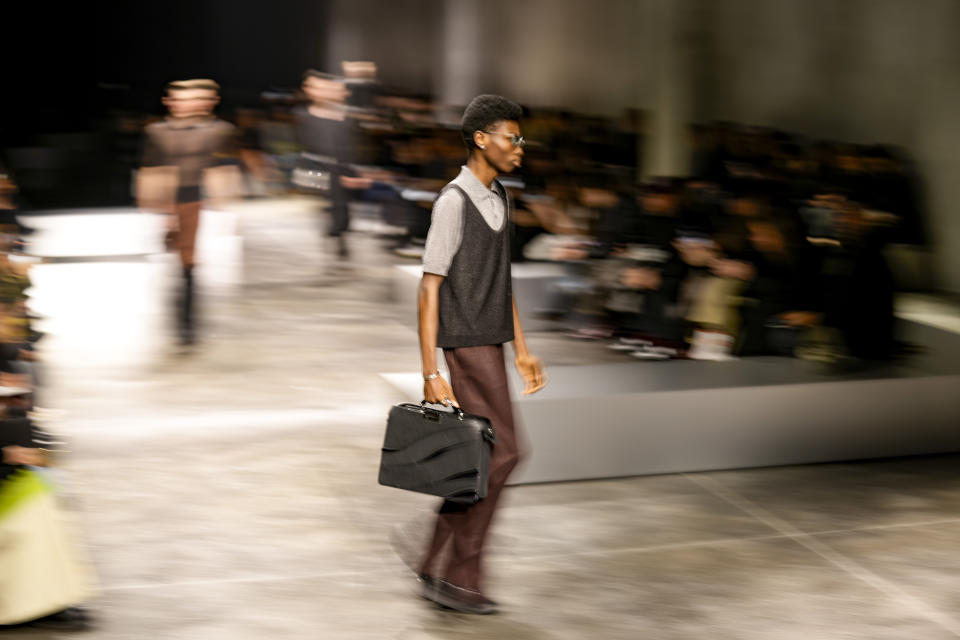 A model wears a creation as part of the men's Fendi Fall-Winter 2024-2025 collection, that was presented in Milan, Italy, Saturday, Jan. 13, 2024. (AP Photo/Antonio Calanni).