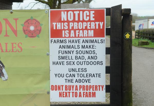 The brilliant sign was put up at Laneside Farm in Lancashire (SWNS)