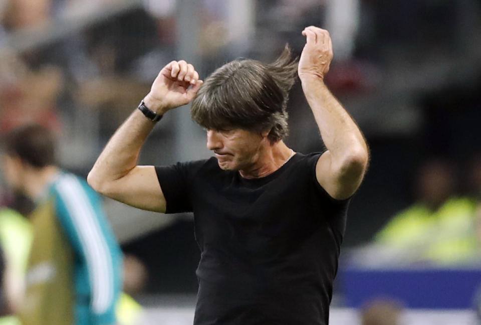 FILE - In this file photo dated Tuesday, Oct. 16, 2018, Germany's head coach Joachim Loew reacts as he watches his players during a UEFA Nations League soccer match between France and Germany at Stade de France stadium in Saint Denis, north of Paris. Germany is last in the group, having collected one point from three games, and is on the brink of relegation but coach Joachim Loew’s decision to stay on in the role is under as much scrutiny as the team’s mettle. (AP Photo/Christophe Ena, FILE)
