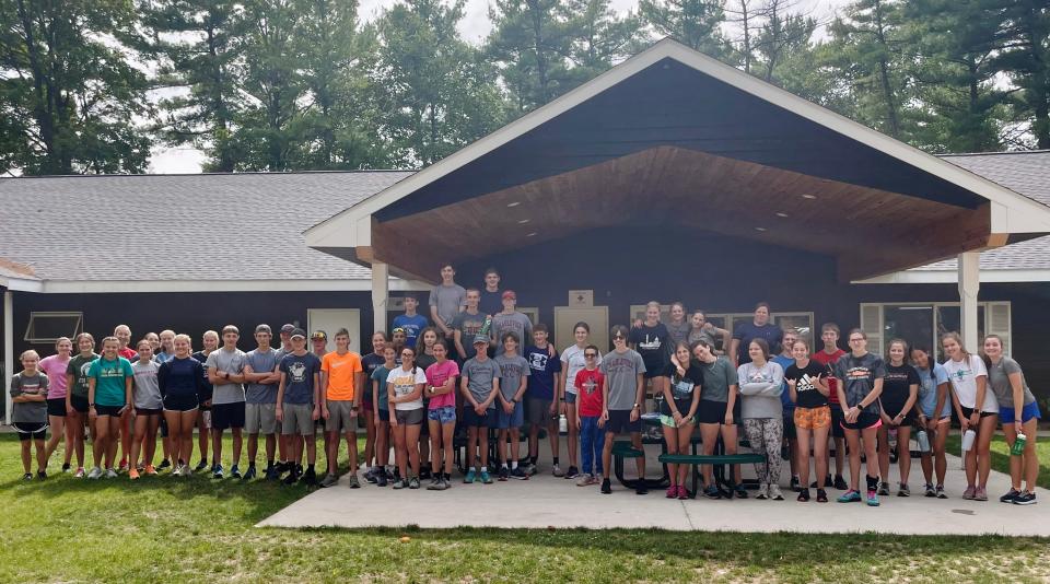 Members of the Boyne City, Charlevoix, Cheboygan and Inland Lakes cross country teams gather for a group shot during team camp held at Park of the Pines in Boyne City recently, a four-day bonding experience and training session leading into the 2023 season.