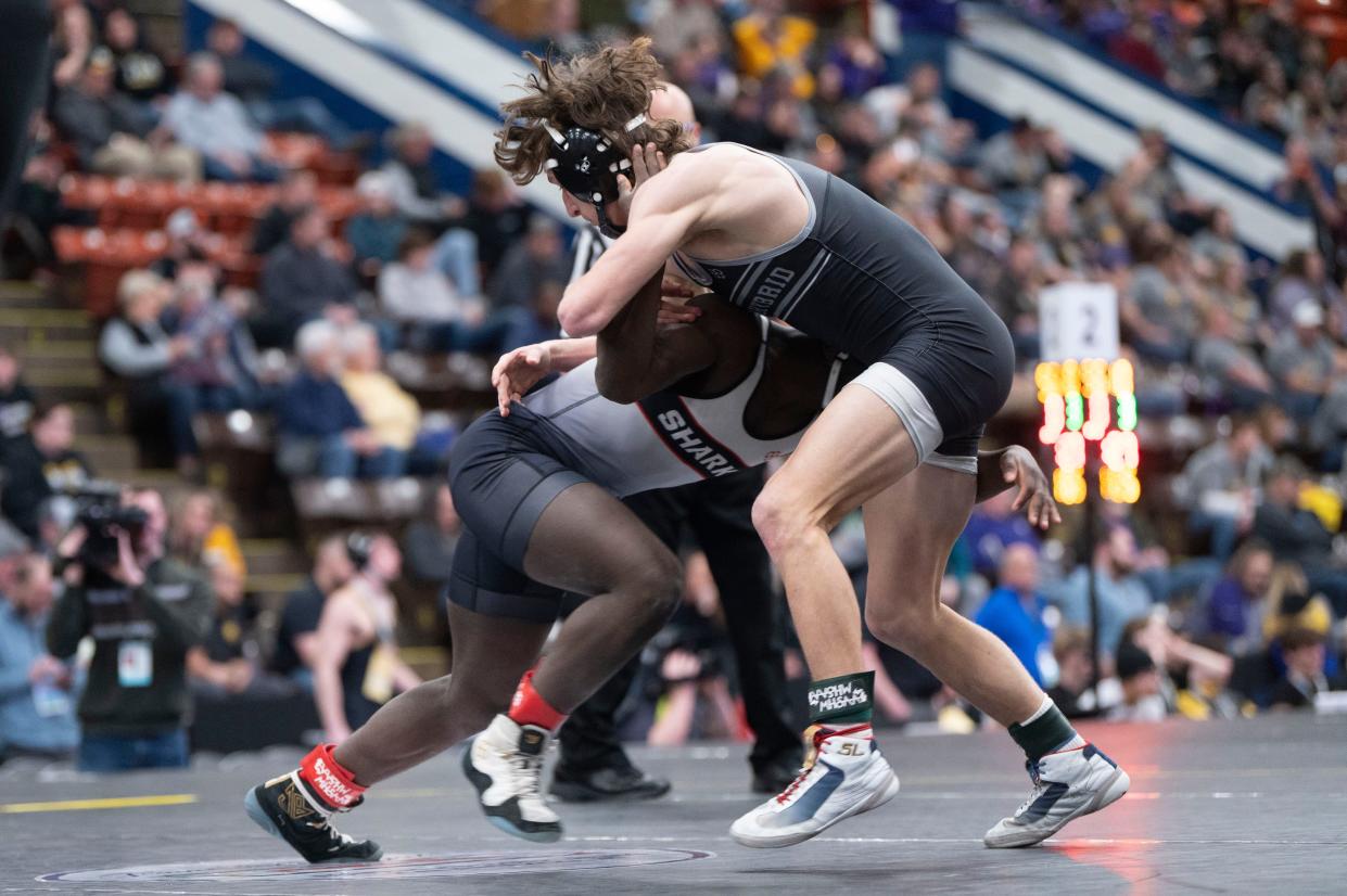 Climax-Scotts/Martin's Anderson Keeler competes against St. Louis' Drew Challender during the MHSAA State wrestling tournament at Wings Stadium in Kalamazoo on Friday, Feb. 23, 2024.