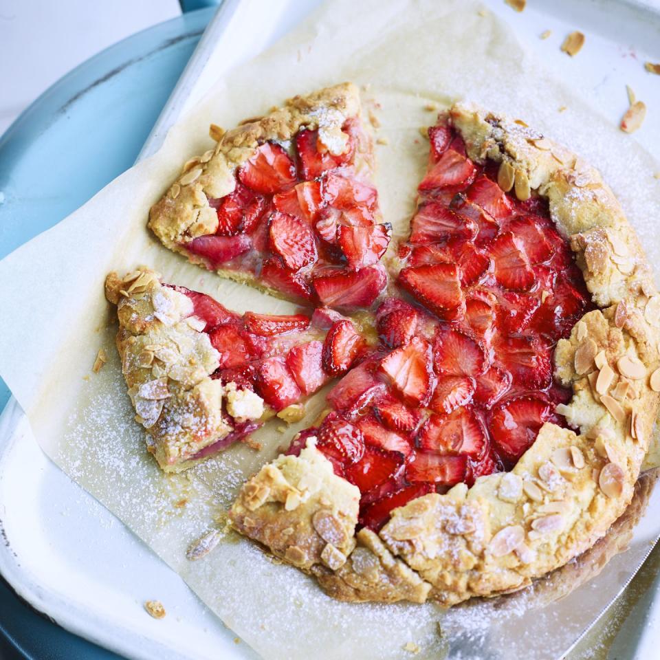 <p>We’ve added a frangipane layer to our galette, for an extra hit of almond. Serve warm with cream or ice cream, or at room temperature.</p><p><strong>Recipe: <a href="https://www.goodhousekeeping.com/uk/food/recipes/a32139955/strawberry-almond-galette/" rel="nofollow noopener" target="_blank" data-ylk="slk:Strawberry and Almond Galette;elm:context_link;itc:0;sec:content-canvas" class="link ">Strawberry and Almond Galette</a></strong></p>