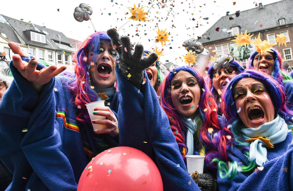 <p>Carnival revellers celebrate the start of their hot season on Women’s Carnival, Feb. 23, 2017, in Duesseldorf, western Germany. (Photo: Federico Gambarini/AFP/Getty Images) </p>