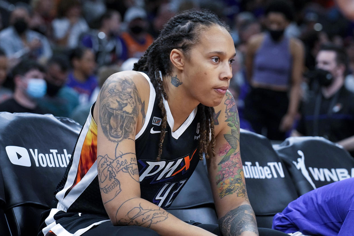 FILE - Phoenix Mercury center Brittney Griner sits during the first half of Game 2 of basketball's WNBA Finals against the Chicago Sky, Wednesday, Oct. 13, 2021, in Phoenix. Russia has freed WNBA star Brittney Griner in a dramatic high-level prisoner exchange, with the U.S. releasing notorious Russian arms dealer Viktor Bout. (AP Photo/Rick Scuteri, File)