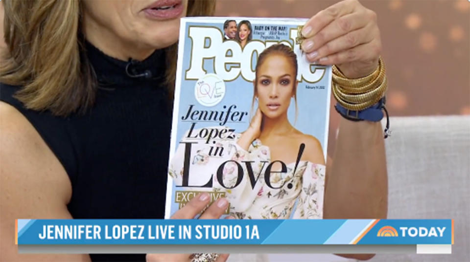 A screengrab of Hoda Kotb holding a People magazine with Jennifer Lopez on the cover on the Today show. Photo: Today/NBC.