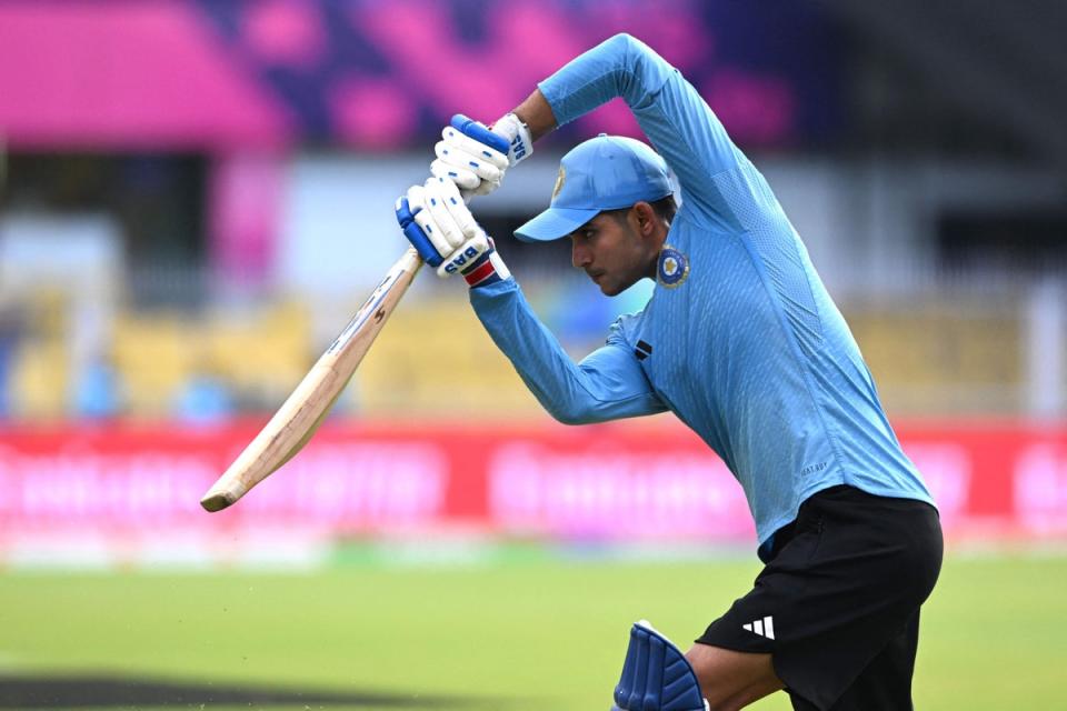 India's Shubman Gill plays a shot during a practice prior to a warm-up match between India and England ahead of the ICC Men's Cricket World Cup, at the Assam Cricket Association Stadium in Guwahati (AFP via Getty Images)