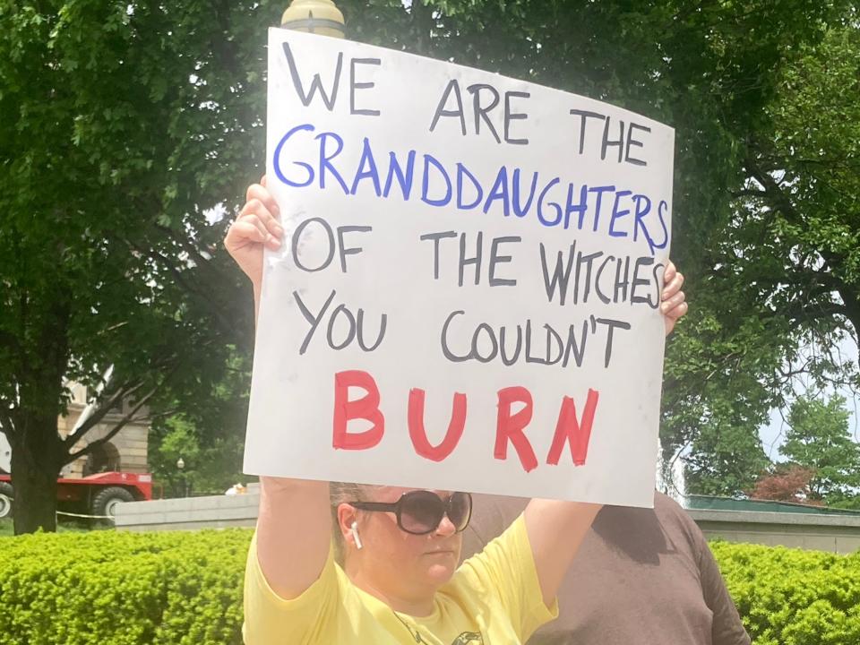 Sarah Winders of Springfield takes part in a Pro Choice with Heart rally on the steps of the Lincoln statue in front of the Illinois Capitol building Sunday. Winders said it is "in my DNA" to protest and that the movement to peel back legalized abortion is "a war against women."