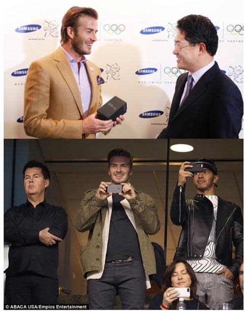 Pictures of David Beckham at Samsung event and using his iPhone