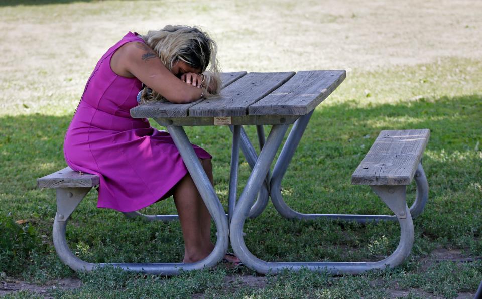 Ayanna Patterson, mother of Alexis Patterson, is overcome with emotion after hearing a report that an Ohio woman's DNA does not match her daughter's.