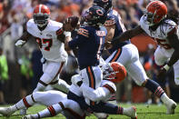 Cleveland Browns defensive end Myles Garrett (95) sacks Chicago Bears quarterback Justin Fields (1) during the first half of an NFL football game, Sunday, Sept. 26, 2021, in Cleveland. (AP Photo/David Dermer)