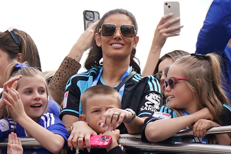 Rebekah Vardy, the wife of Leicester City's Jamie Vardy, on an open-top bus parade in Leicester to celebrate winning the Sky Bet Championship title