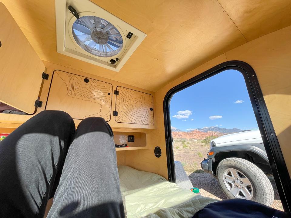 The author in the camper's bed.