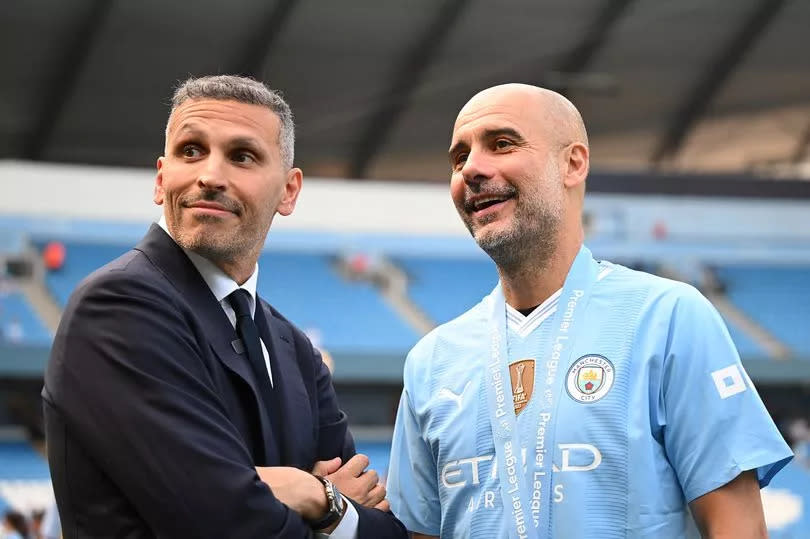 Manchester City chairman Khaldoon Al Mubarak and Pep Guardiola