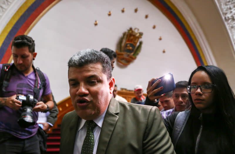 Venezuelan lawmaker Luis Parra holds a news conference in Caracas