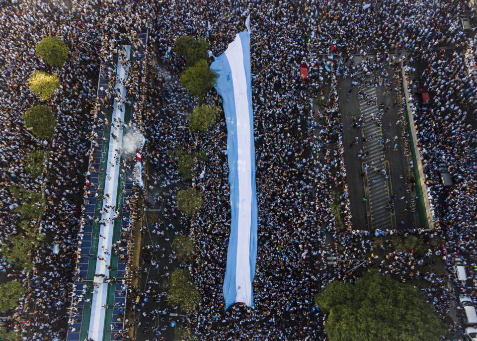 BUENOS AIRES, ARGENTINA - DECEMBER 18: In this aerial view, fans of Argentina celebrate the FIFA World Cup Qatar 2022 win against France on December 18, 2022 in Buenos Aires, Argentina. (Photo by Marcelo Endelli/Getty Images)