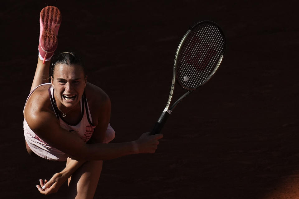 Aryna Sabalenka of Belarus serves against Iryna Shymanovich of Belarus during their second round match of the French Open tennis tournament at the Roland Garros stadium in Paris, Wednesday, May 31, 2023. (AP Photo/Christophe Ena)