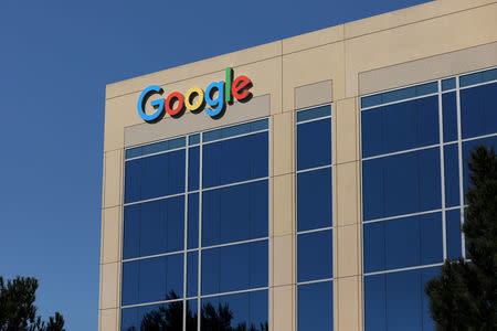 FILE PHOTO: The Google logo is pictured atop an office building in Irvine, California, U.S., August 7, 2017. REUTERS/Mike Blake/File Photo