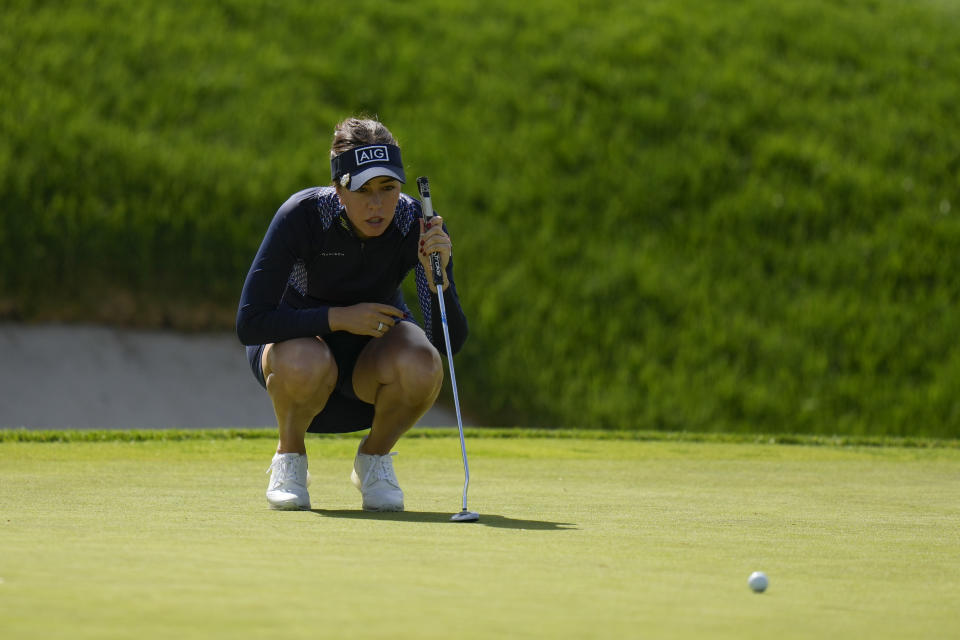 Georgia Hall, of England, lines up a shot on the second green during the first round of the LPGA Cognizant Founders Cup golf tournament, Thursday, May 9, 2024, in Clifton, N.J. (AP Photo/Seth Wenig)