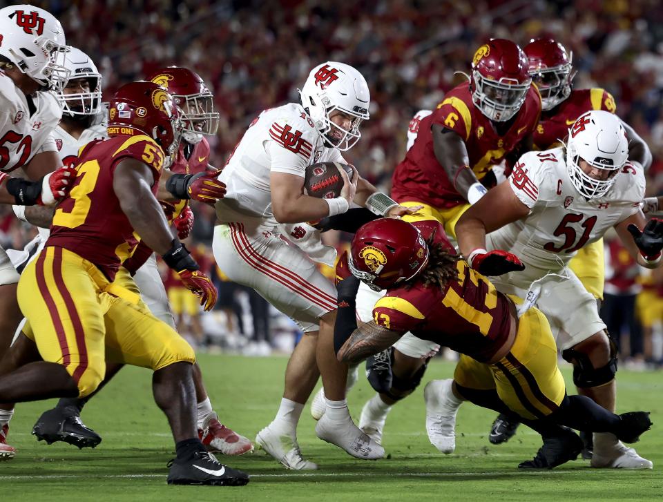 Utah Utes quarterback Bryson Barnes drives against the USC Trojans at the Los Angeles Memorial Coliseum on Saturday, Oct. 21, 2023. | Laura Seitz, Deseret News