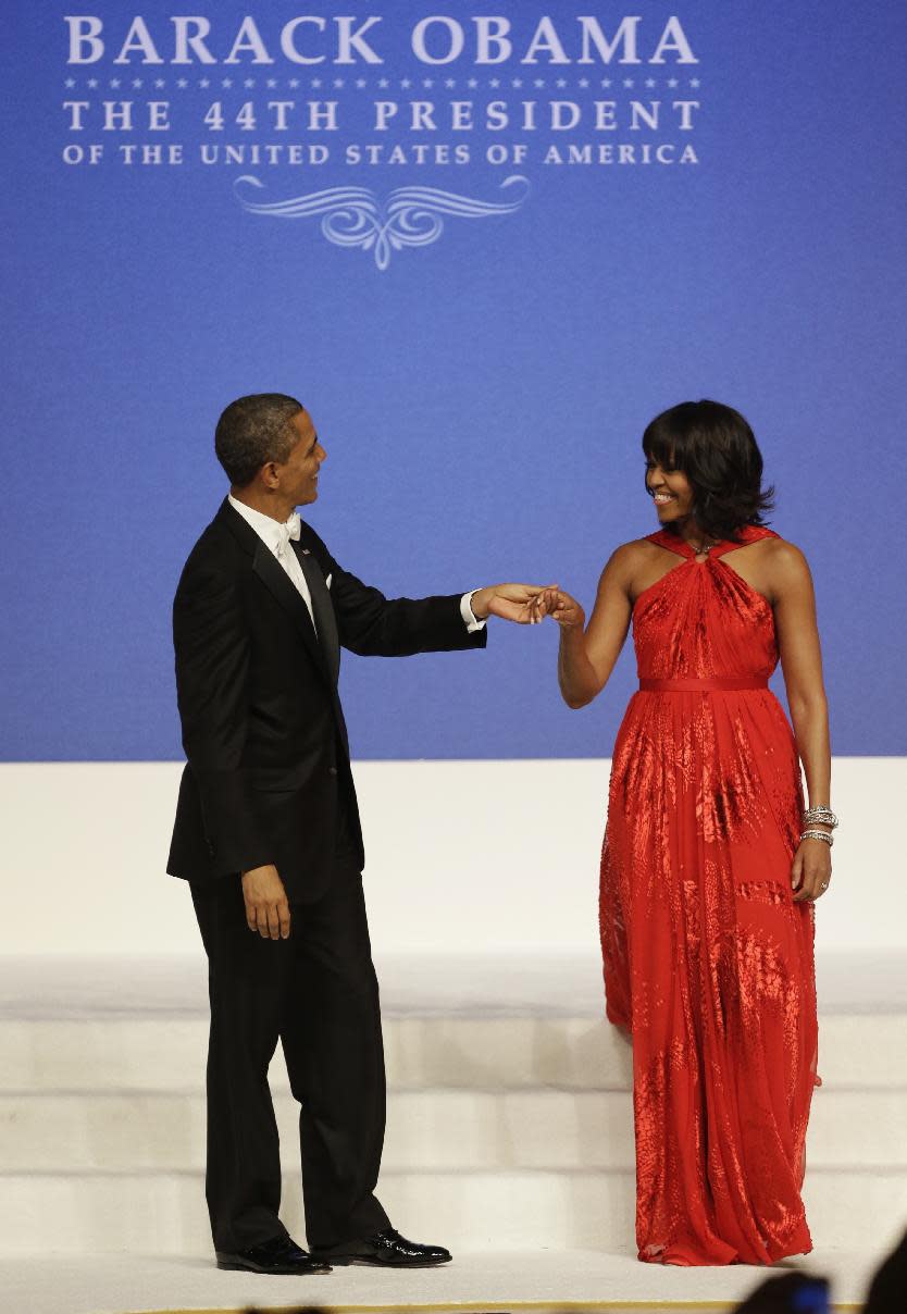 President Barack Obama and first lady Michelle Obama dance at Commander-in-Chief's Inaugural Ball at the 57th Presidential Inauguration in Washington, Monday, Jan. 21, 2013. (AP Photo/Jacquelyn Martin)