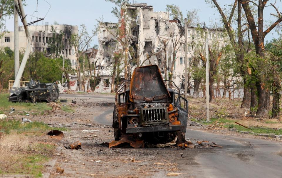 Military vehicles destroyed in the town of Rubizhne, in the Luhansk region (Reuters)