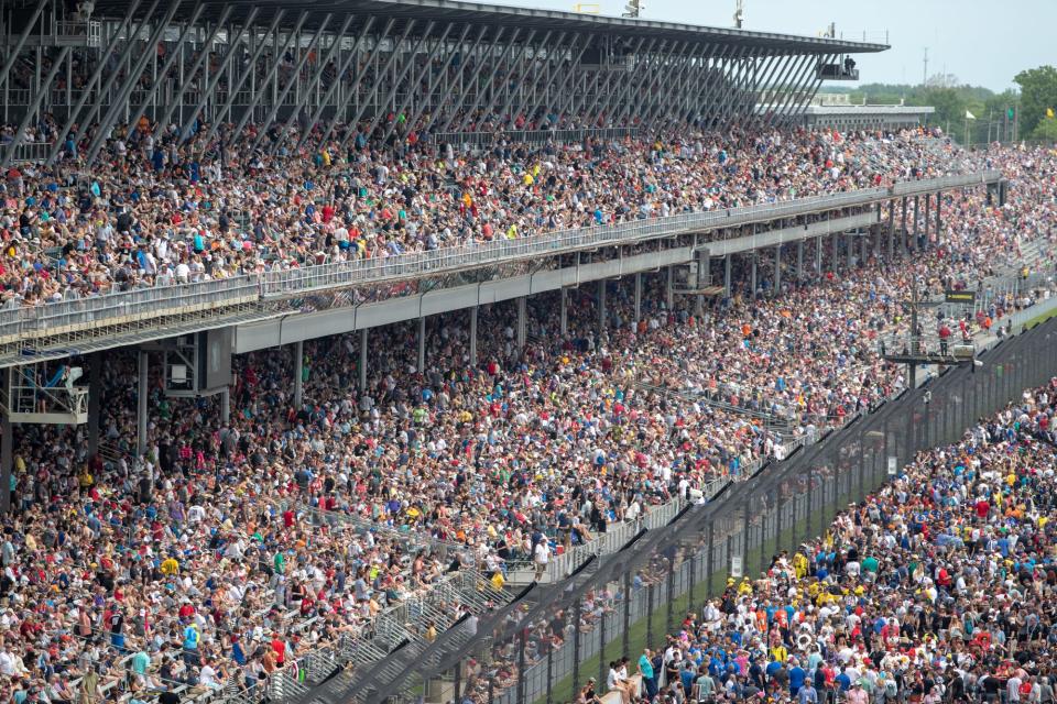 Fans crowd in prior to the 103rd running of the Indianapolis 500 on Sunday, May 26, 2019.