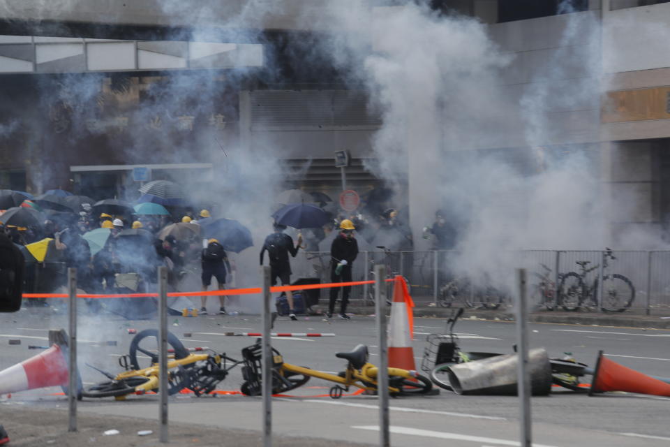 Police fire tear gas at anti-government protesters at Shatin, Hong Kong, Oct. 1, 2019. (Photo: Kin Cheung/AP)