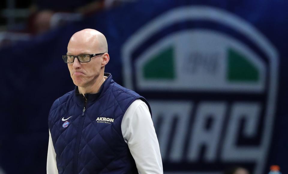 Akron coach John Groce watches his team play against Miami in the quarterfinals of the Mid-American Conference Tournament on Thursday in Cleveland.