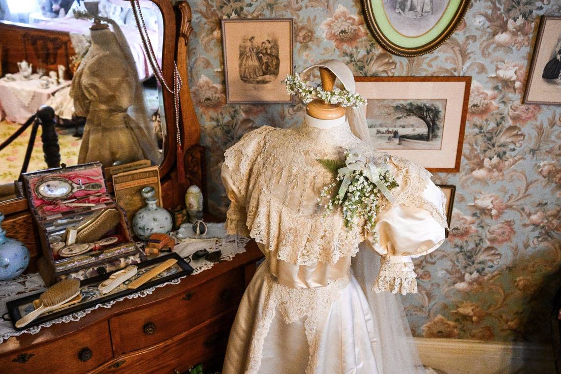 A dress worn by Dr. Meux’s oldest daughter Mary during her wedding in 1906 is displayed in her bedroom on the second floor of the home. CRAIG KOHLRUSS/ckohlruss@fresnobee.com