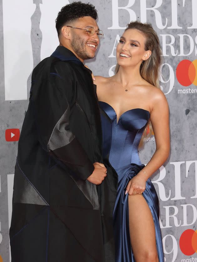 Alex Oxlade-Chamberlain and Perrie Edwards at the 2019 Brit Awards (Photo: SOPA Images via Getty Images)