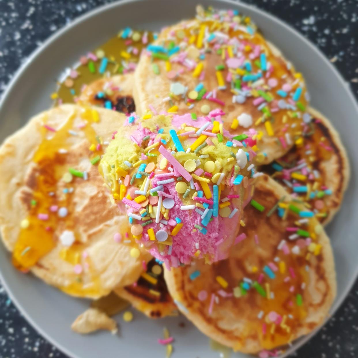 ice cream with sprinkles on homemade pancakes for dessert