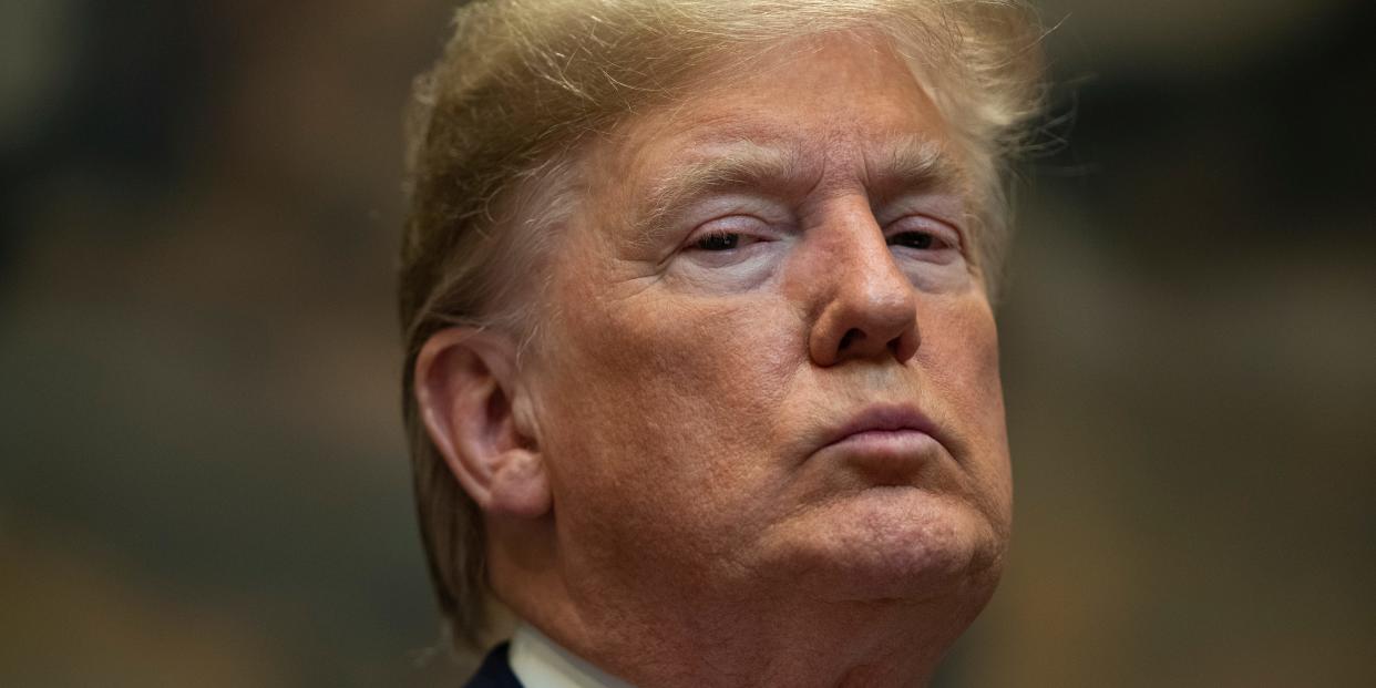 President Donald Trump listens as Secretary of the Interior David Bernhardt speaks on proposed changes to the National Environmental Policy Act, at the White House, Thursday, Jan. 9, 2020, in Washington. (AP Photo/ Evan Vucci)